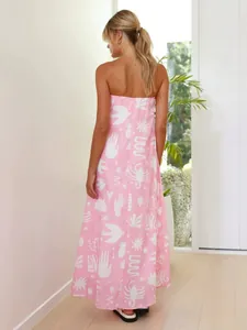 Bohemian pink printed strapless maxi dress with eclectic white patterns for summer vacation