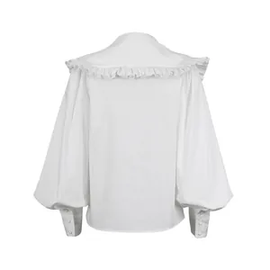 Back view of white cotton blouse with large ruffled doll collar and lantern sleeves
