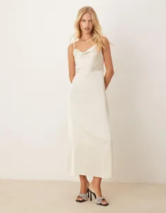 Elegant cream cowl neck satin slip maxi dress for formal evening wear or party occasions.