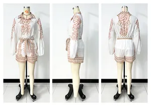 Three-view display of women's printed two-piece set with long sleeves and shorts