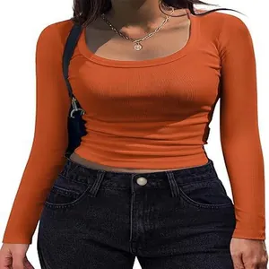 Detailed view of women's orange slim fit ribbed long sleeve T-shirt with square neck design.