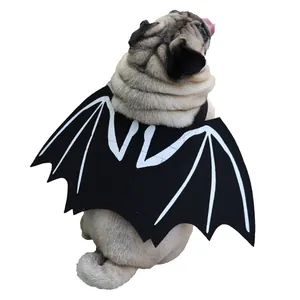 Detailed back view of a pug dog wearing a creative black bat wings Halloween pet costume