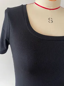 Close-up detail of black ribbed fabric on short sleeve square neck slim fit women's T-shirt