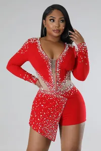 Tuta rossa sexy trasparente con strass e perle per abbigliamento da festa elegante donna