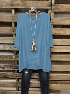 Elegante blauwe tuniek met 3/4-mouwen en een unieke gelaagde asymmetrische zoomafwerking