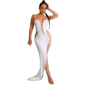 Sexy white camisole evening gown with sheer panels and rhinestone details