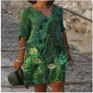 Bohemian style green abstract print V-neck midi dress with elegant half sleeves