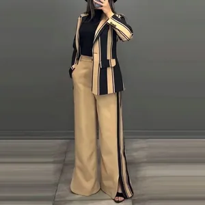 Elegant women striped two-piece suit set including blazer and wide-leg pants on model