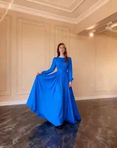 Elegant long-sleeved blue pleated chiffon maxi dress for formal evening occasions