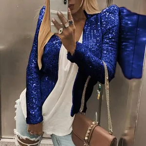 Detail view of a blue sequined blazer with a stylish stand collar and slim fit