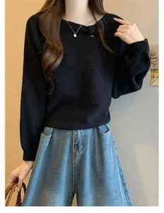 Soft black knit sweater featuring a unique asymmetric collar and batwing sleeves