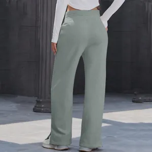 Back view of lightweight high waist wide-leg trousers in muted green for women
