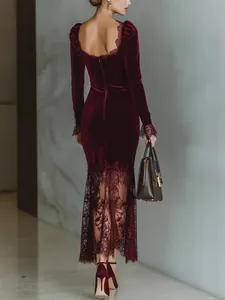 Elegant burgundy velvet maxi dress with lace detailing and backless design for banquet