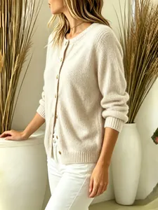 Soft cream knit button-down cardigan with ribbed cuffs and round neck for women wear