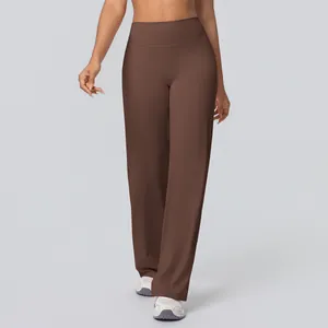 High-waisted brown wide-leg yoga pants for fitness and running shown on a model.