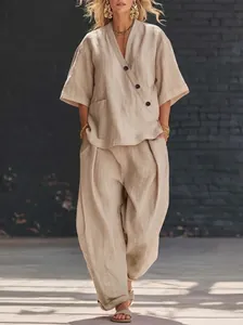 Full view of women's casual linen two-piece set in sand color with wide-leg trousers