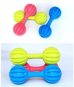 Macro view of colorful TPR rubber dog barbell toys for chewing and teeth cleaning.