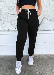 Detailed view of women's black high-waisted drawstring sweatpants for sports and leisure