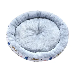 Comfortable round plush pet bed with cute cartoon animal prints for cats and small dogs