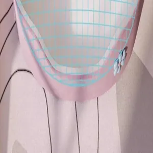 Detailopname van de roze mesh-stof en het blauwe bloemaccent op het prinses-huisdierbed