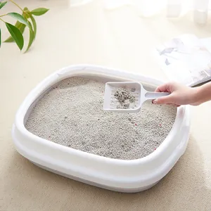 Modern semi-enclosed anti-splash cat litter box with high sides and a matching scoop