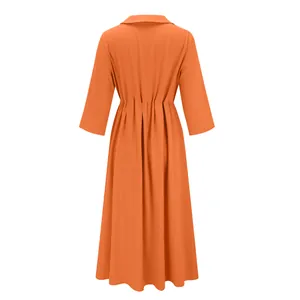 Back view of orange cotton linen midi dress with pleated waist and collar detail.