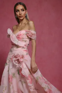 Close-up of pink floral French vintage off-shoulder dress with 3D flower detail