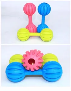 Detailed view of colorful TPR rubber dog dumbbell toys with teeth cleaning grooves
