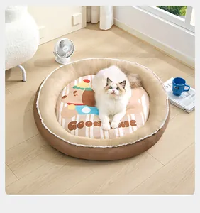 Round pet bed with cute cartoon dog print shown in a cozy home setting with a cat