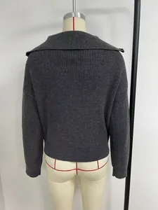 Back view of a vintage dark grey knit sweater with a large turnover collar detail