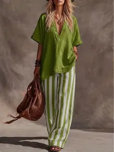 Full look of a bohemian casual green V-neck top and striped wide-leg pants two-piece set
