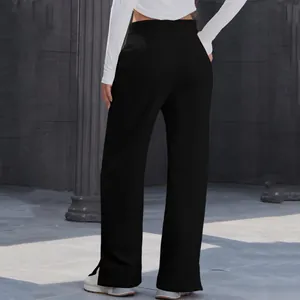 Back view of women's high-waist black wide-leg trousers featuring soft flowy fabric