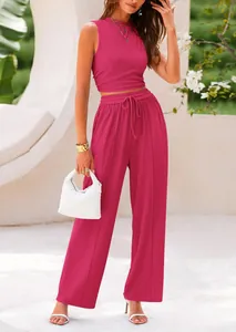 Detailed view of women's magenta 2-piece knit set with sleeveless top and wide-leg pants