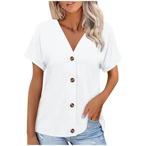 Detailed view of women's white V-neck short sleeve T-shirt with brown buttons