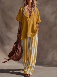 Boho mustard yellow V-neck linen top and striped wide-leg pants two-piece set for women.