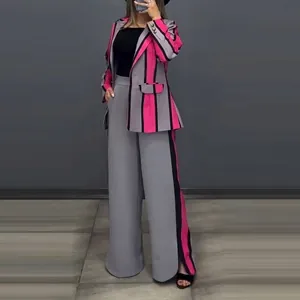 Detail of women's pink and grey striped blazer suit with wide-leg trousers