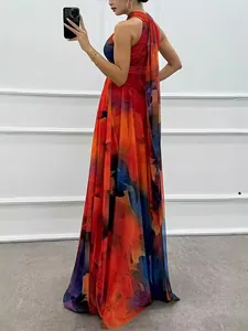 Elegant sleeveless floral halter maxi dress with abstract print and flowing silhouette