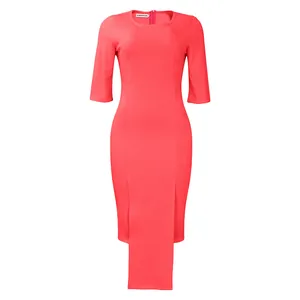 Detail view of the elegant coral pink bodycon office dress featuring a unique front flap design