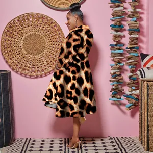 Detail view showing the side profile of a slim fit leopard print dress with lapel collar