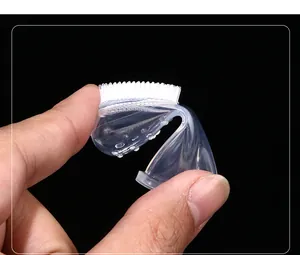 Macro view of a soft silicone pet finger toothbrush showing high flexibility and bristles