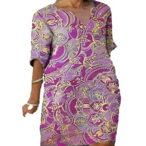 Close-up detail of the purple and yellow mandala print on this V-neck boho style dress