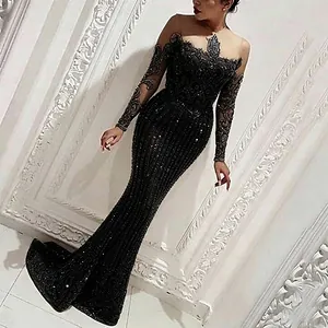 Elegant black sequined mermaid evening gown with lace sleeves and illusion neckline