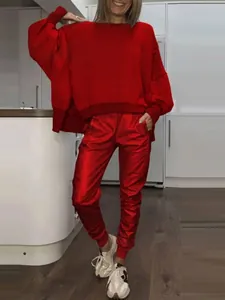 Vibrant red two-piece lounge set featuring oversized side-slit top and jogger pants