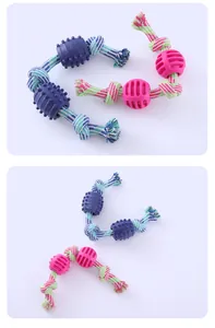 Detailed view of durable cotton rope dog toys featuring textured rubber chew balls in blue and pink