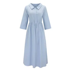 Light blue cotton linen casual midi dress with three-quarter sleeves and a collar.