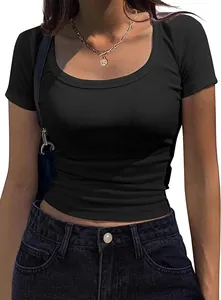 Close-up detail of women's black slim fit ribbed knit short sleeve scoop neck t-shirt