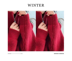 Dettaglio di un maglione rosso lavorato a maglia con mezza zip e trama a coste.