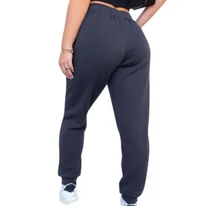 Back view of women's high-waisted dark grey joggers showing comfortable fit and soft fabric