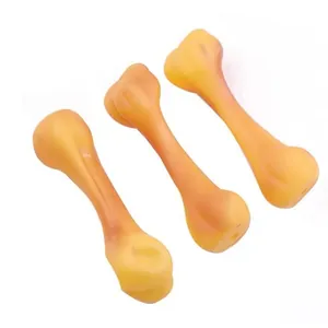 Set of three durable orange vinyl squeaky bone toys for dog boredom and training