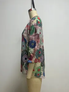 Side view of women's casual summer floral print shirt on mannequin for detailed fit.